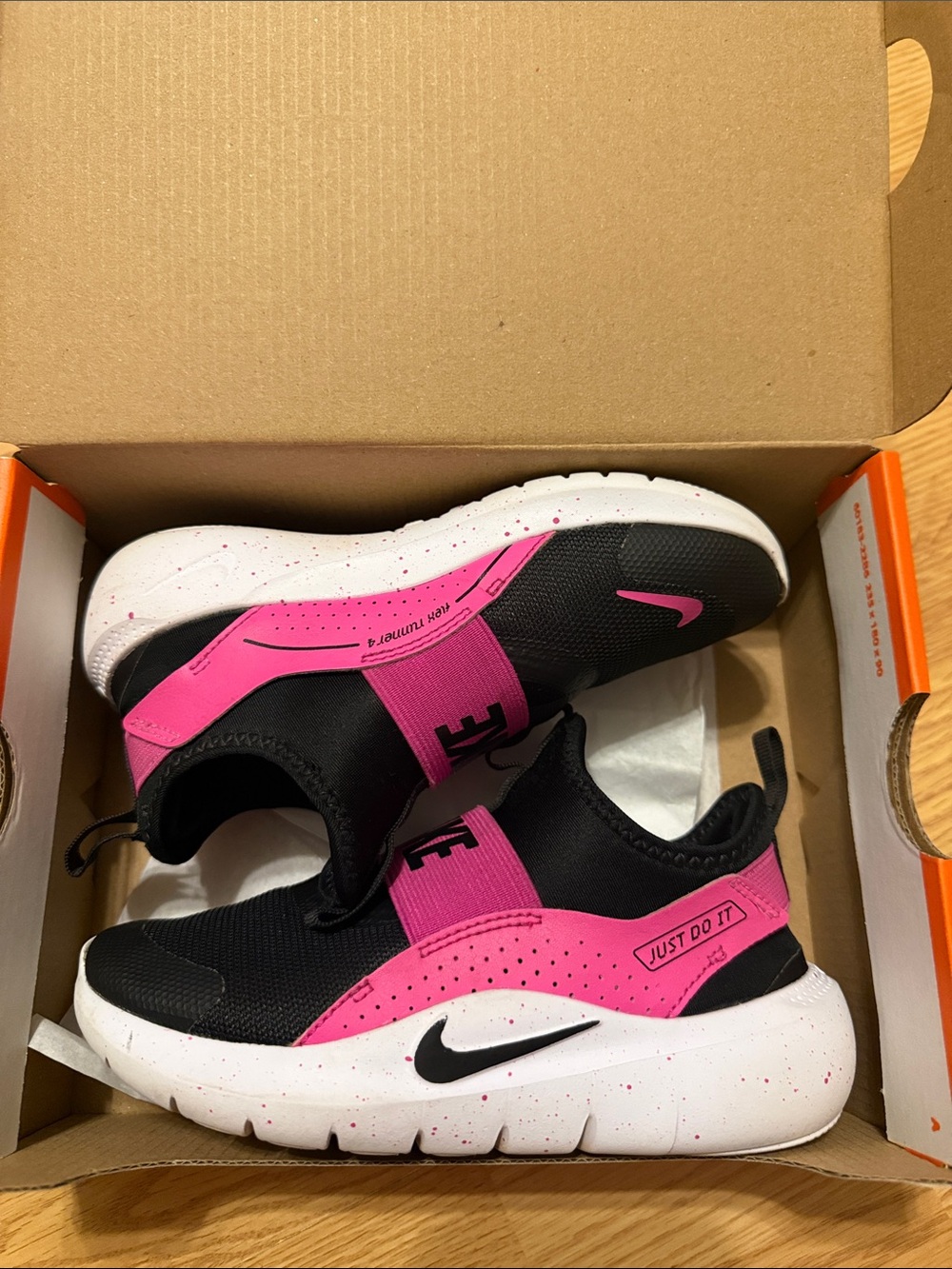 Nike Kids Black and Pink Slip-On Sneakers